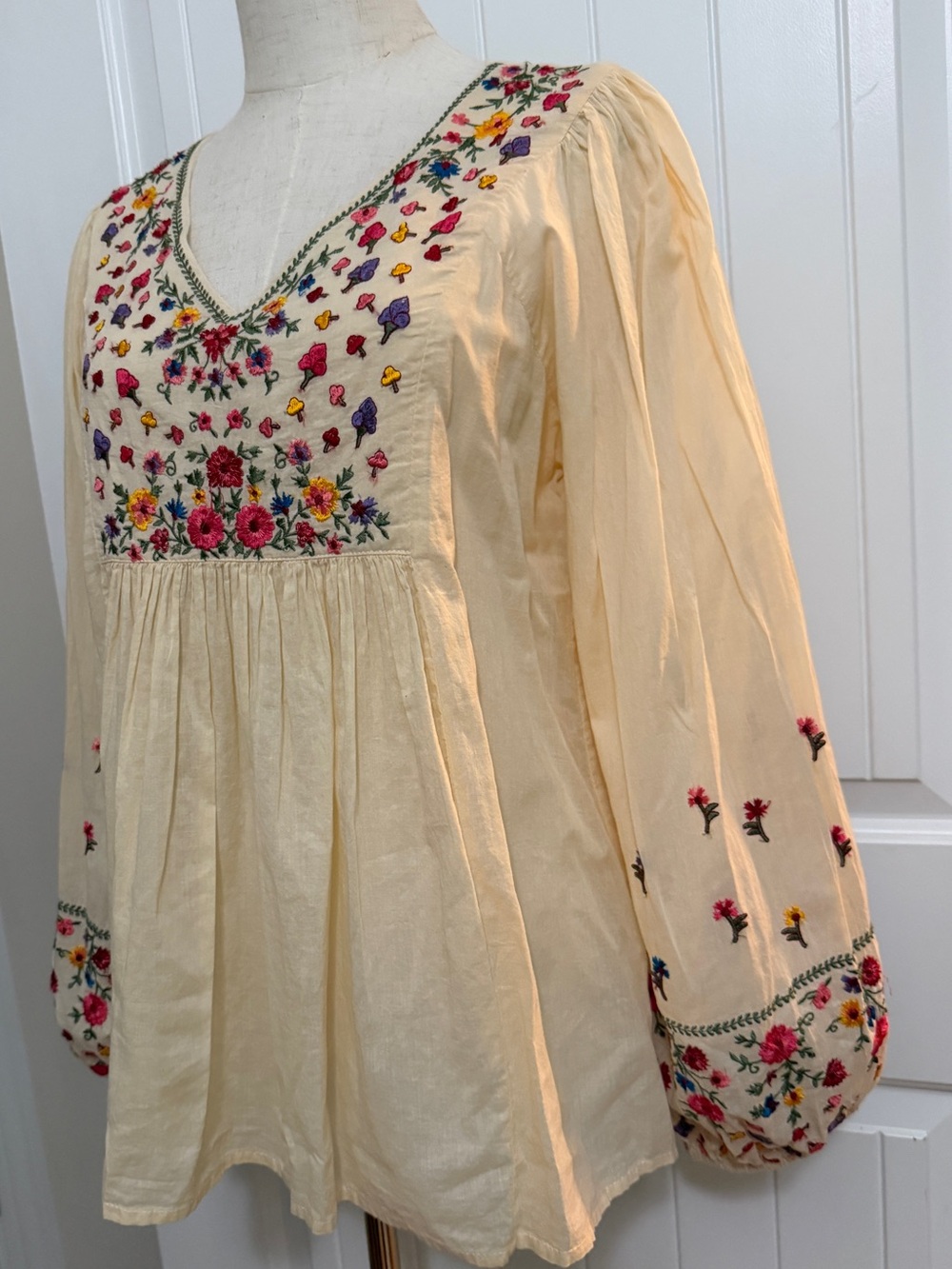 Cream Embroidered Peasant Blouse with Colorful Floral Detail - Picture 6 of 17